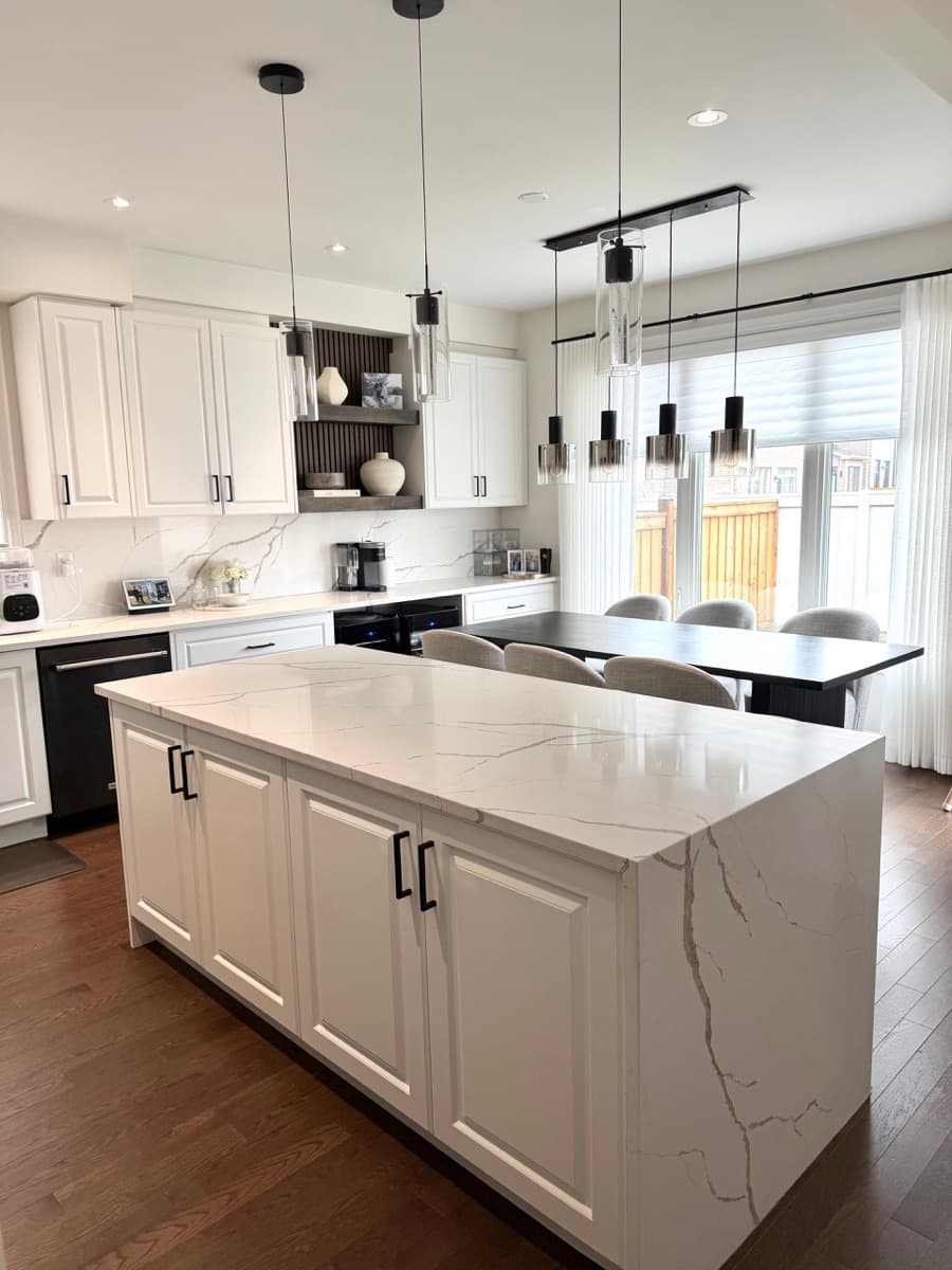 Barrie kitchen after clean — marble waterfall island